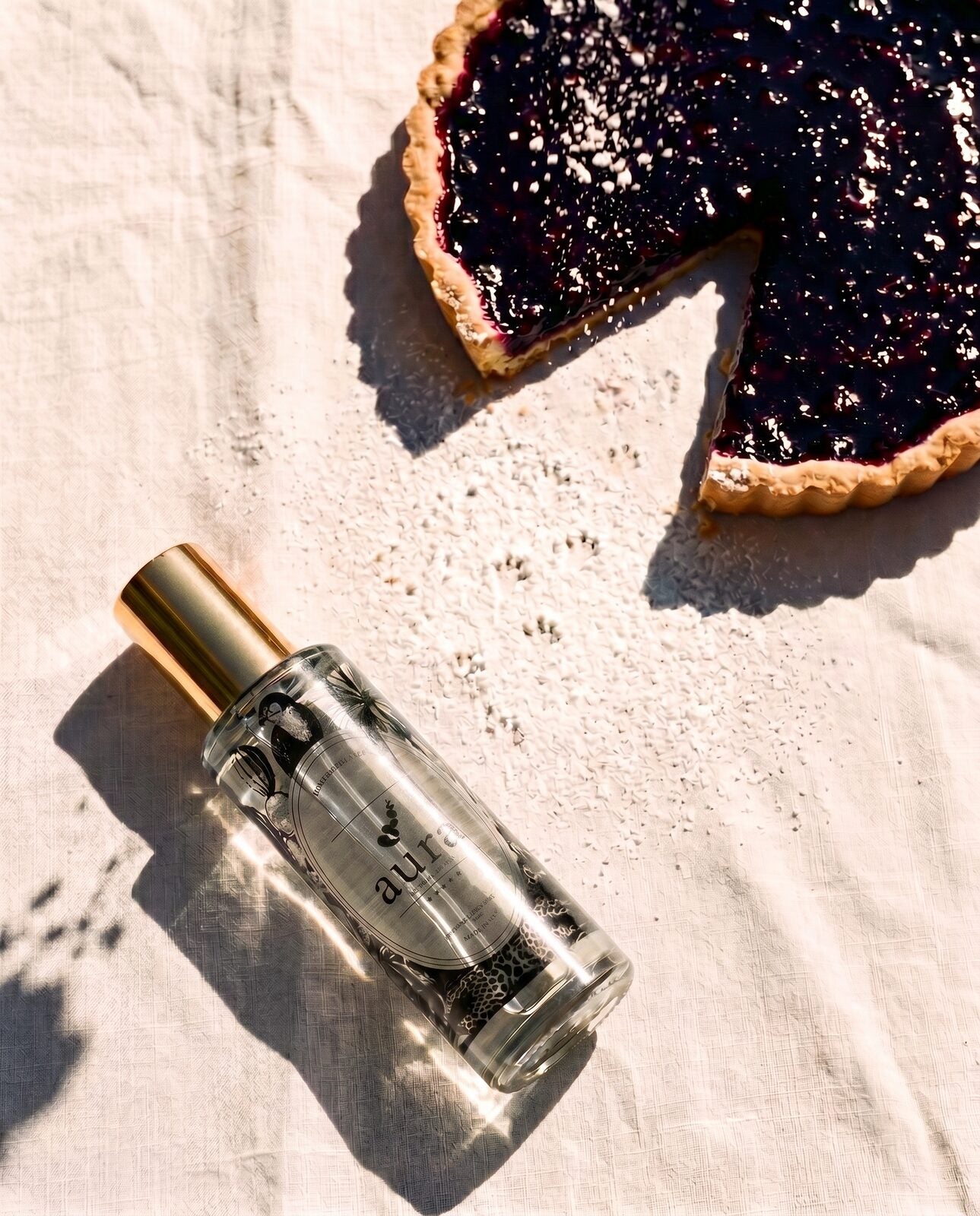 Cassis room & linen spray — styled still life