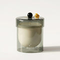 Corsica scented candle — smoked sage glass, ivory wax, engraved aura logo