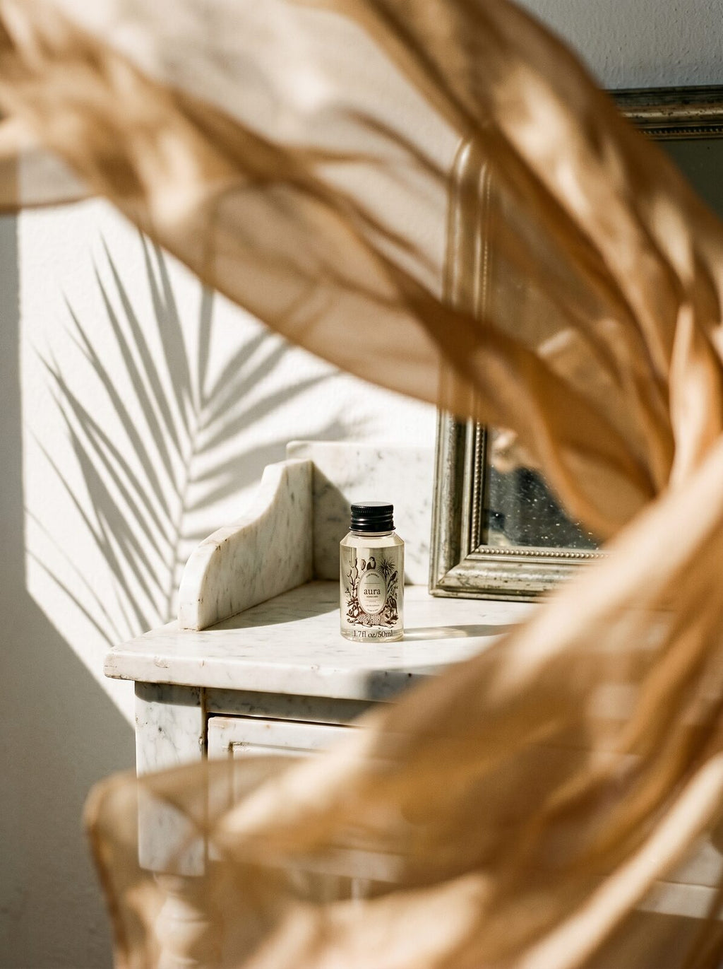 Monaco diffuser oil — dark elegant still life