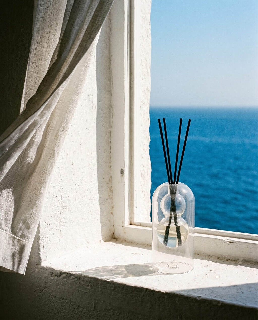 Maddalena reed diffuser — turquoise archipelago editorial scene