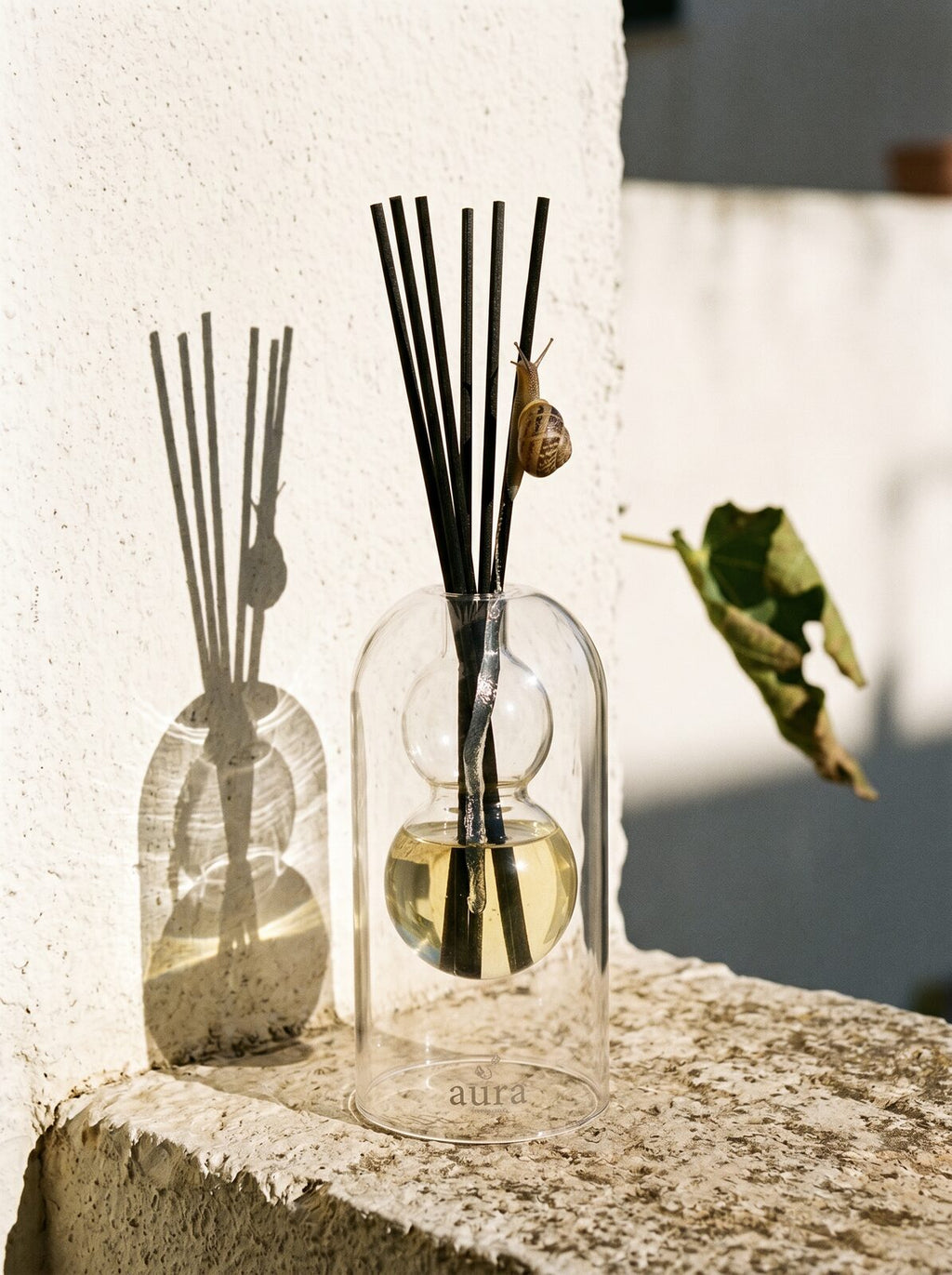 Capri reed diffuser — island-coast editorial scene
