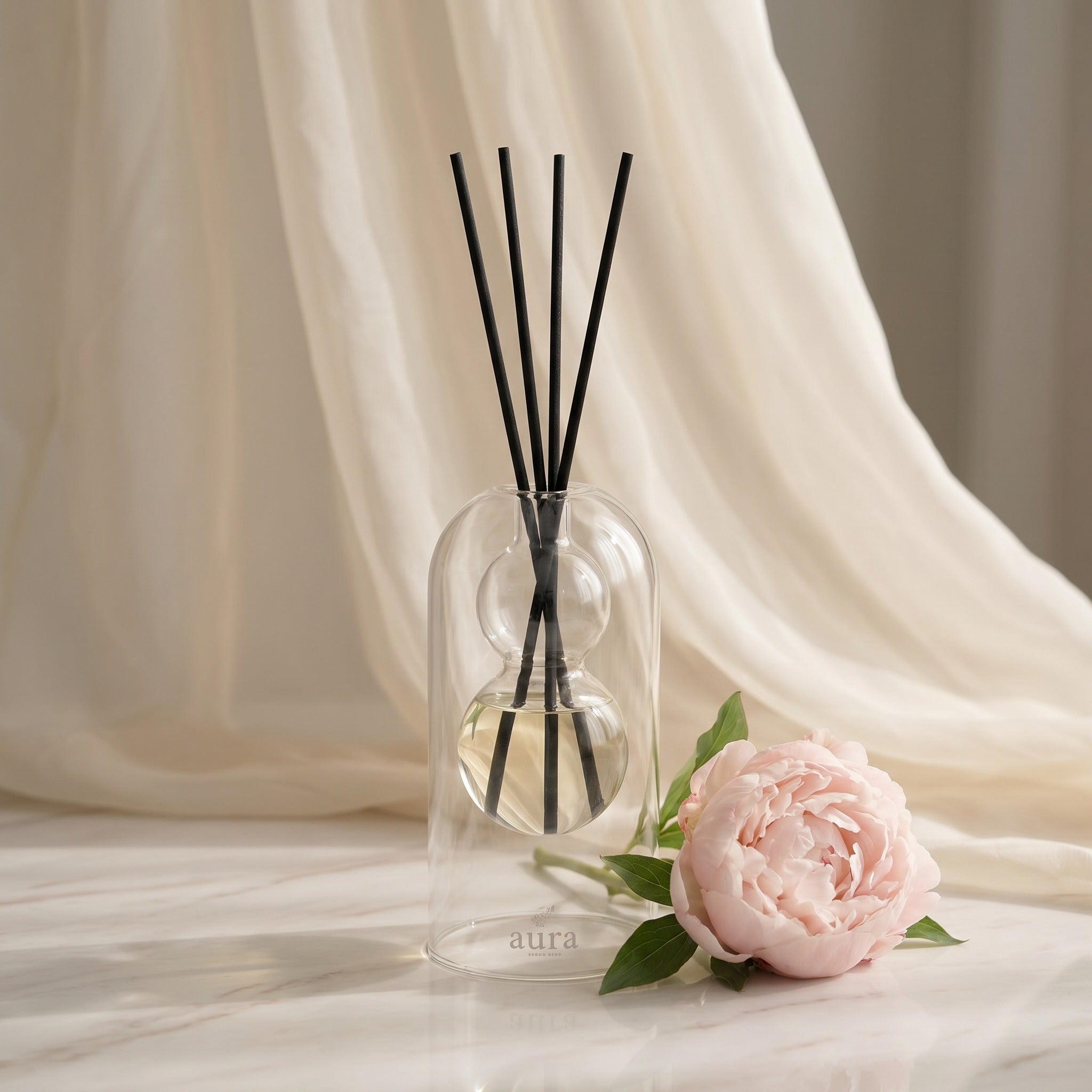 Bella reed diffuser — warm meditative still life