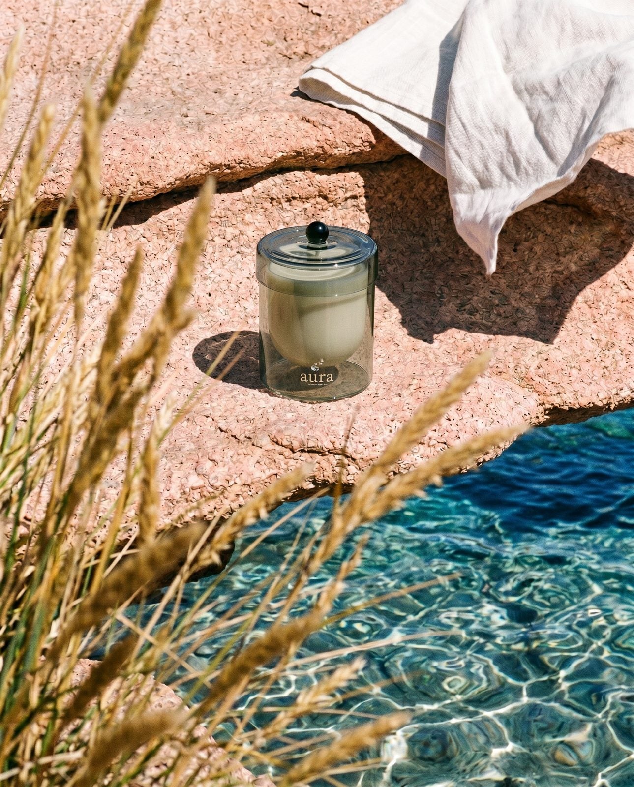 Maddalena candle — turquoise archipelago editorial scene