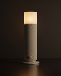 AURA Lumière — encendido, tapa con luz tipo vela