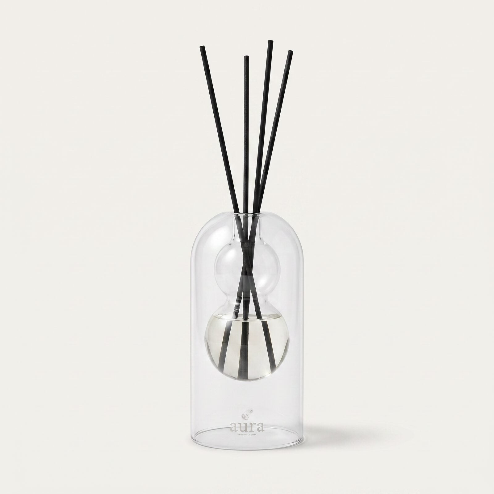 Unwind Better reed diffuser — clear glass bottle with rattan reeds