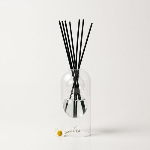 Bella reed diffuser — clear glass vessel with fiber reeds