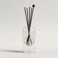 Capri reed diffuser — clear glass vessel with fiber reeds