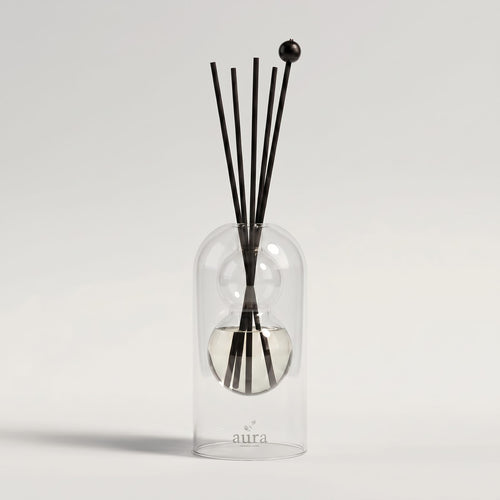 Capri reed diffuser — clear glass vessel with fiber reeds
