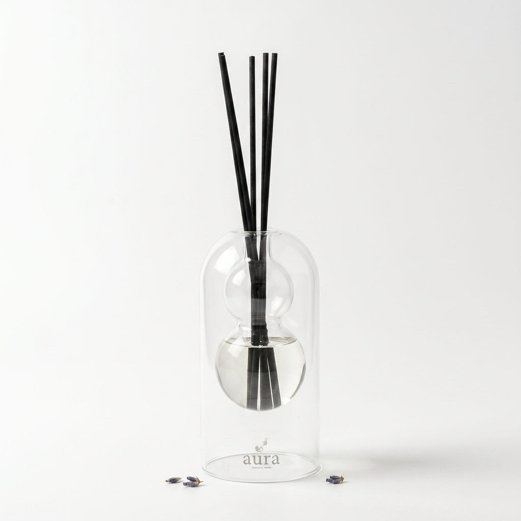 Provence reed diffuser — clear glass vessel with fiber reeds